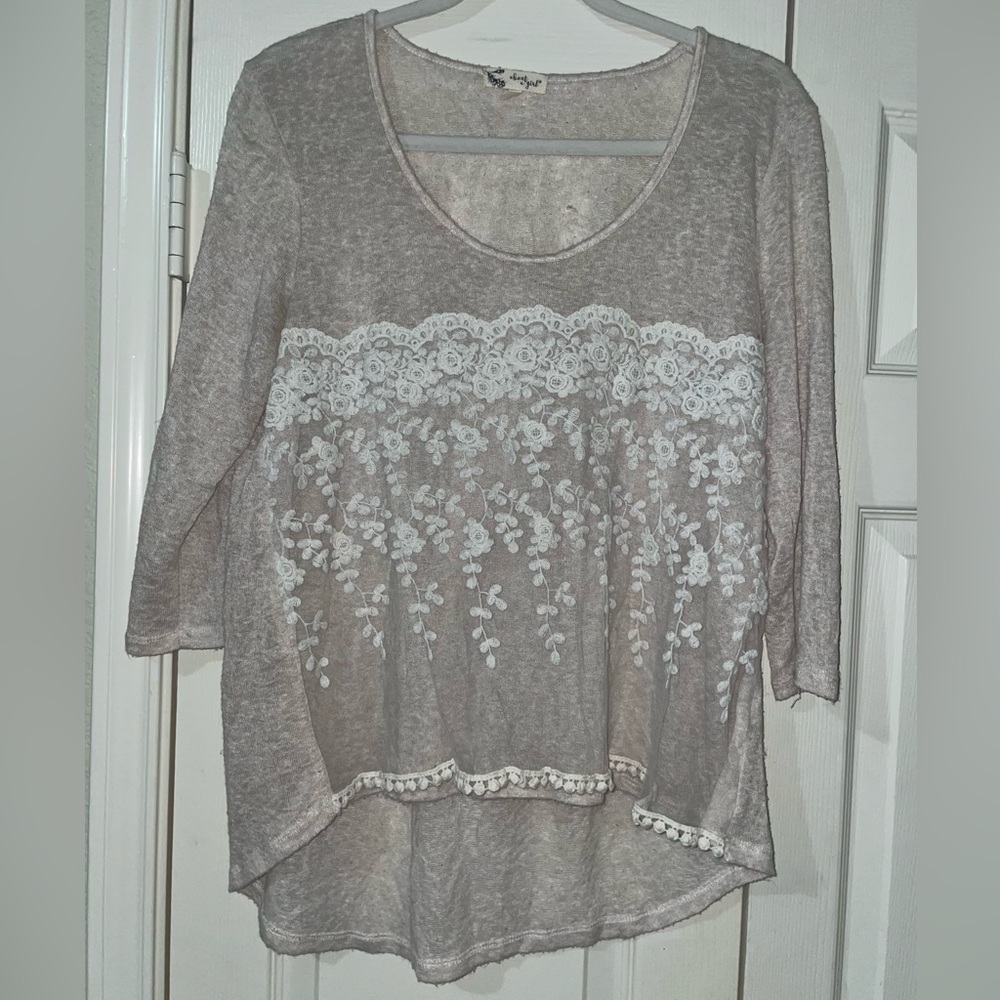 About a girl cream floral 3/4 sleeve blouse in Large.